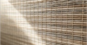 Close view of textured hospitality wallcovering in warm light
